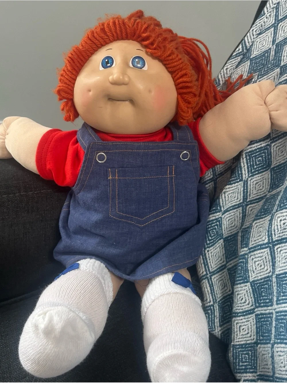 Orange-Haired  Cabbage Patch  Kids Doll with Blue Eyes has tooth retainers